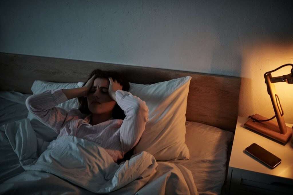 stress and sleep impacting a young women